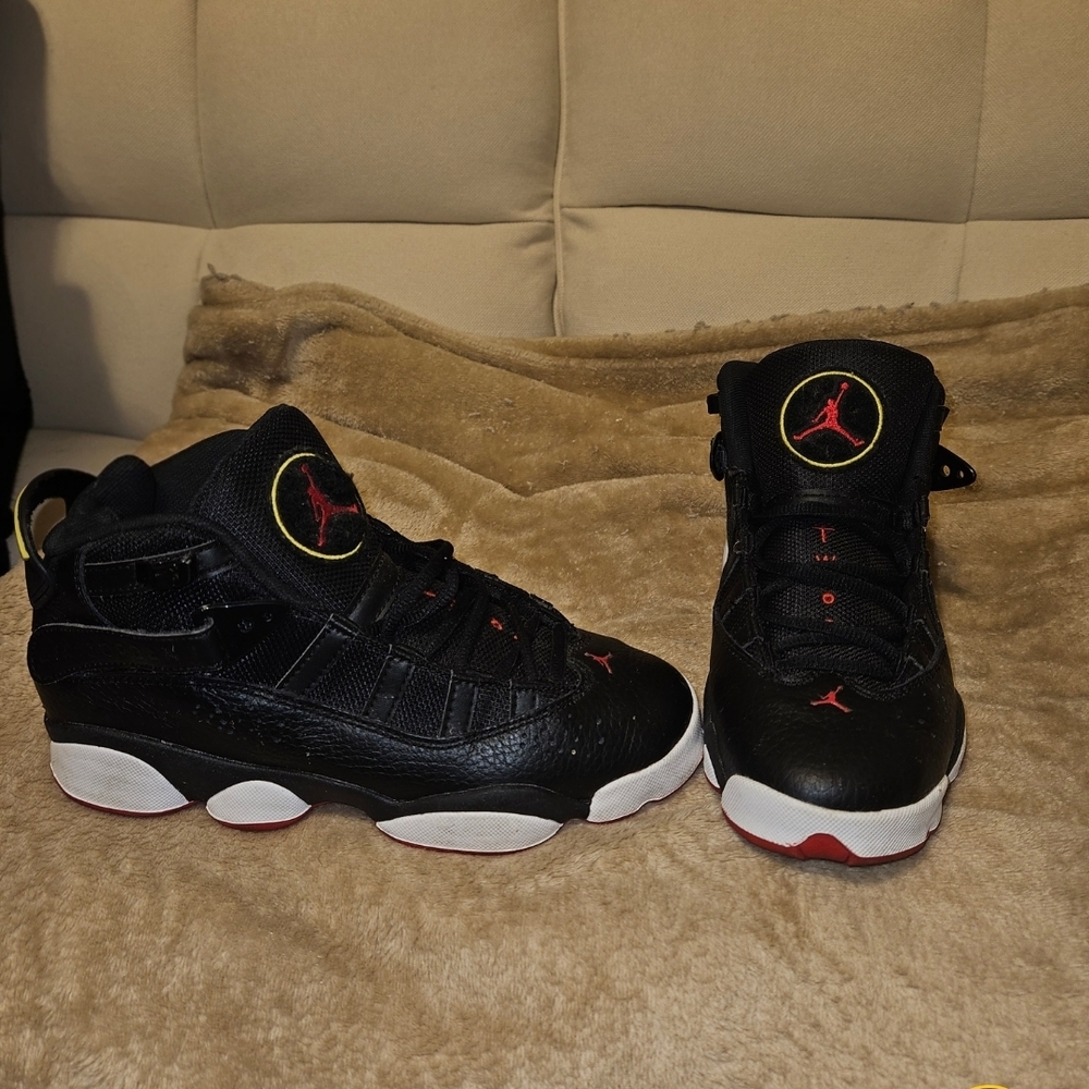 Stylish Black and Red Kids Sneakers Air Jordans 5.5Y Is a 7.5 In Womens Size